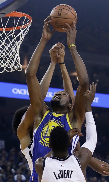 Durant’s double-double lifts Warriors past Nets 116-100